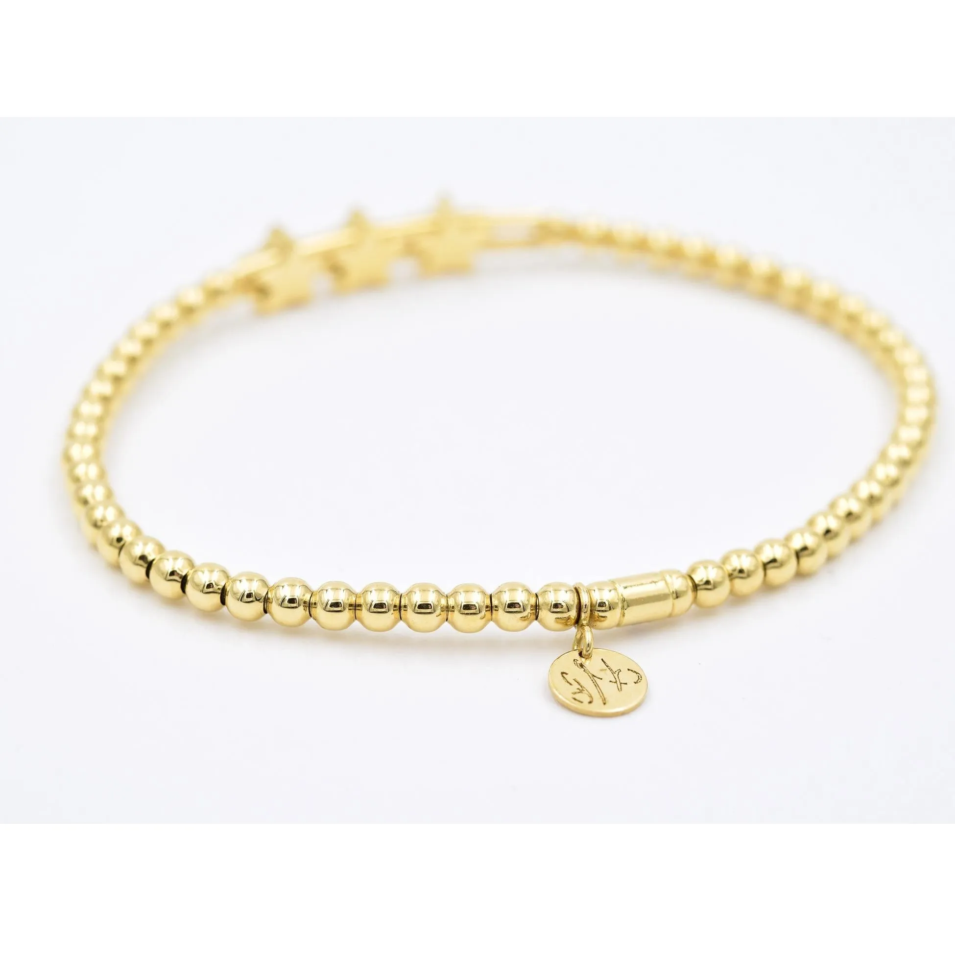 Hulchi Belluni Fidget Bracelet with Three Pave Diamond Moveable Star Stations Yellow Gold Stretch Stackable