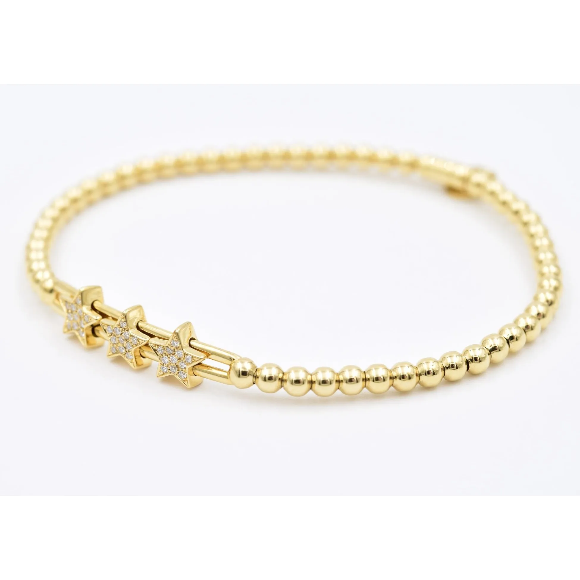 Hulchi Belluni Fidget Bracelet with Three Pave Diamond Moveable Star Stations Yellow Gold Stretch Stackable